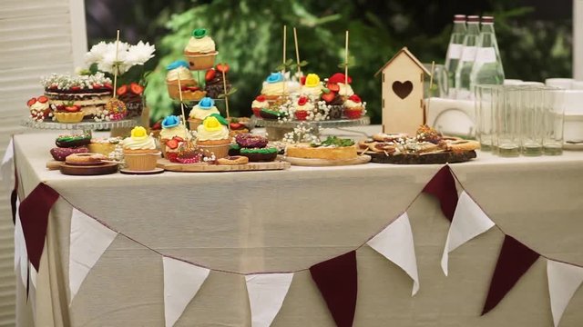 Candy Bar on the table in a beautiful park.