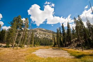 Heart shaped cloud in the mountains