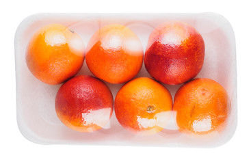 blood red orange fruit in container