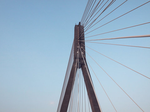 Closeup of bridge on clear blue sky