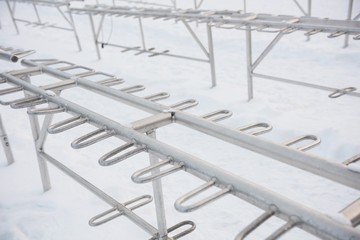 Empty racks for snow sports equipment