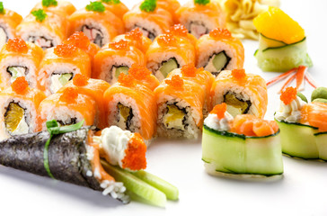 Sushi rolls over white background
