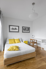 Bedroom with big wooden bed