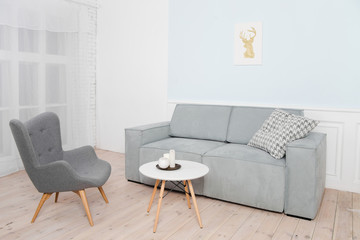 Gray armchair in the interior
