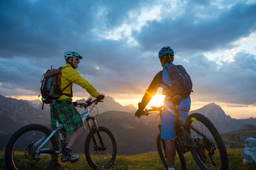 mountain bike tour by sunset - sunrise
