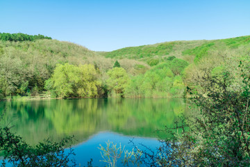 Fototapeta na wymiar The nature of the Crimea is a beautiful place. The lake near the Skelsky cave near the village of Podgornoye, Sevastopol, Balaklava district.