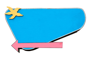 Weathered blue, pink and yellow beach town sign.