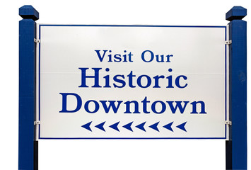 VISIT OUR HISTORIC DOWNTOWN town welcome sign. Isolated.