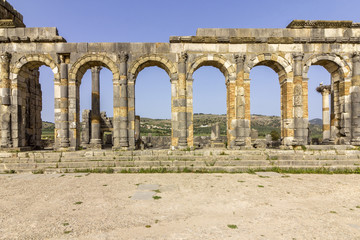 Fototapeta na wymiar Exterior of the Basilica at archaeological Site of Volubilis, ancient Roman empire city, Unesco World Heritage Site