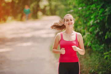 sport girl it the gym and on the jog