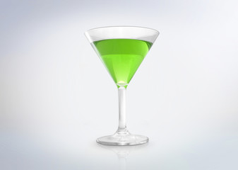 Glass of a green cocktail drink. Isolated on white background. 