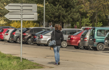 Walking woman in street of Hodonin town