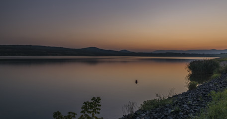 Sunset near Milada lake in north Bohemia