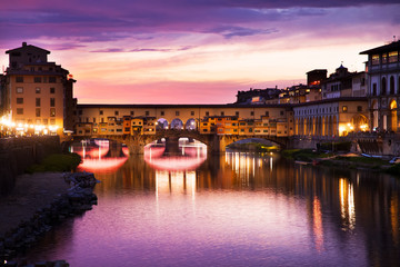 sunset above Ponte Vecchio - Old Bridge view from Arno river bank
