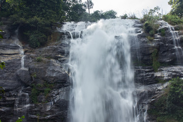 smooth motion of waterfall in deep forest