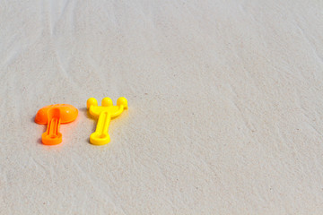 Toys for childrens sandboxes against the sea and the beach