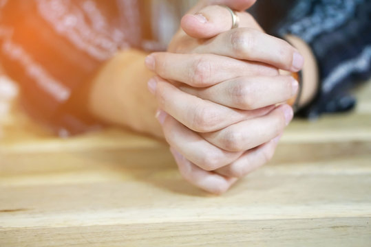 closeup of man hand praying in soft tone