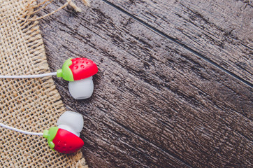earphones buds macro closeup on table