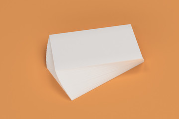 White blank business cards mock-up on orange background