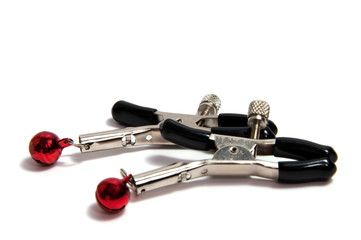 Breast clamps, sex toys for sexual adults, sado masochistic games.