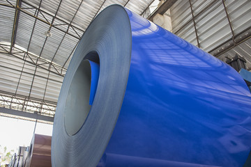 Blue color coated coiled steel for metal sheet rolling machine ; tile/roof / wall manufacturing ; metal sheet coated steel that made from hot-dip ; industrial equipment background