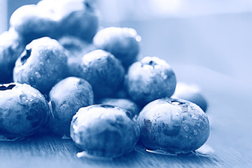fresh berries blueberries close-up scattered black and white