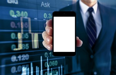 Man showing smartphone with stock chart background
