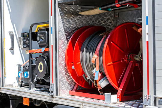 fire hoses and other fire fighting equipment on board a fire truck