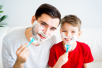 Father and son shaving - 150416226