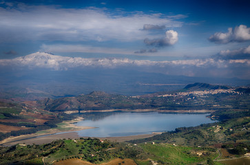 sicilia, pozzillo lake, and mount etna in backgroud