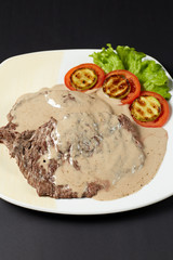 Beef in cognac sauce. Italian style. Italian food. Italian cuisine.