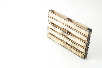 6 inch wooden pallet over the white background