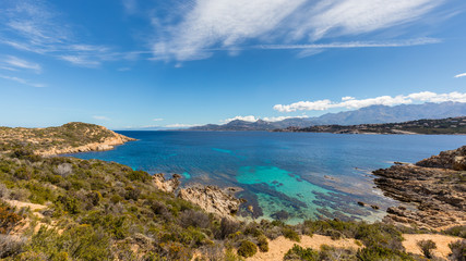 Turquoise sea and rocky coastline at Revellata in Corsica