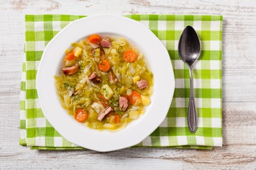 Homemade cabbage soup, cooked on smoked ribs.