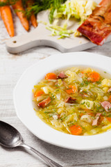 Homemade cabbage soup, cooked on smoked ribs.