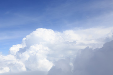 Cloud and blue sky from the airplane windows