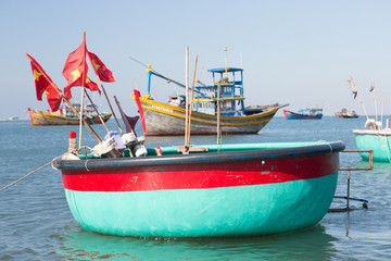 Naklejka na ściany i meble Mui Ne fishing village and traditional Vietnamese fishing boats