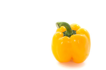 Yellow capsicum or sweet pepper isolated on white background