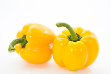 Yellow capsicum or sweet pepper isolated on white background