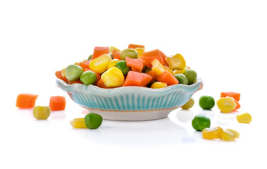 Frozen mixed vegetables isolated on white background