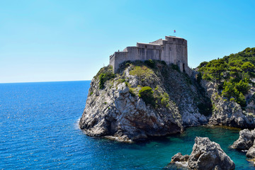 Fototapeta na wymiar The Lovrijenac Fortress on cliffs over the Adriatic Sea in Dubrovnik, Croatia