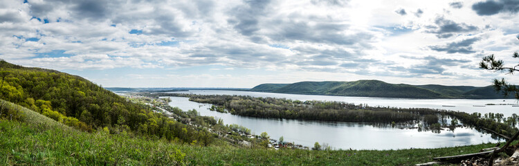 Fototapeta na wymiar Panoramic view on Volga river and Zhigulevskie mountains in spring near Samara city, Russia 