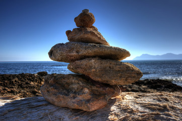 Fototapeta na wymiar Stones piled on beach