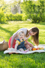 Young woman in the park with children