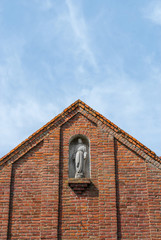 upper part of the abandoned cathedral Jesus statue