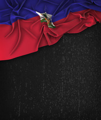 Haiti Flag Vintage on a Grunge Black Chalkboard With Space For Text © natanaelginting