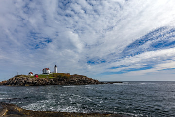 Fototapeta na wymiar Cape Neddick Lighthouse (Nubble Lighthouse) at Old York Village, Maine, USA