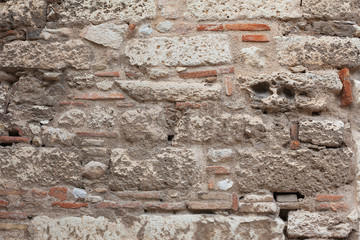 Ancient stone wall close-up.