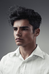 Fototapeta premium Close up portrait of a very handsome man with black hair