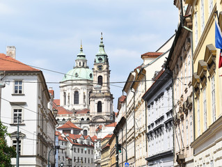 Obraz premium A view of the Church of Saint Nicholas: a Late-Gothic and Baroque cathedral in the Old Town of Prague in Czech Republic.